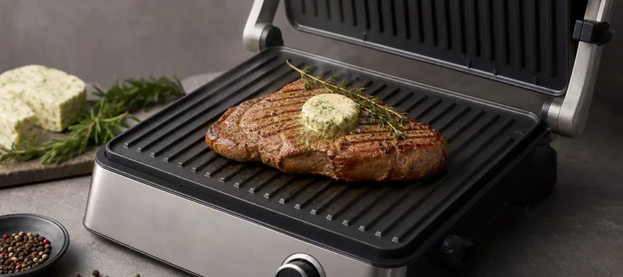 Kontaktgrill Rindersteak mit Kraeuterbutter